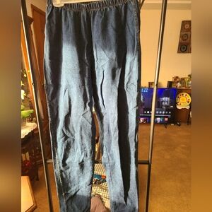 Elastic waist, straight leg jeans.  Last photo shoes true color of denim